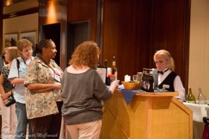 Knitters line up for free drinks at the TKGA Yarn Tasting Party